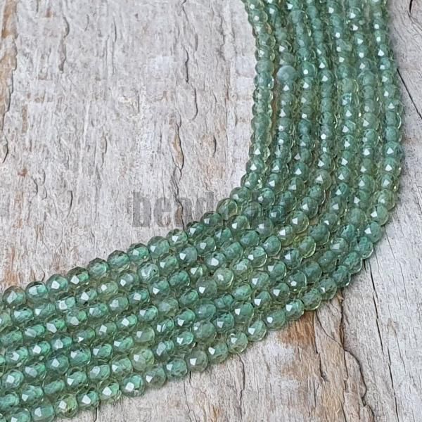 koralky-z-mineralu-apatit-zeleny-3mm-brusene-fazetovane-leskle-zelene-priesvitne-gulate-