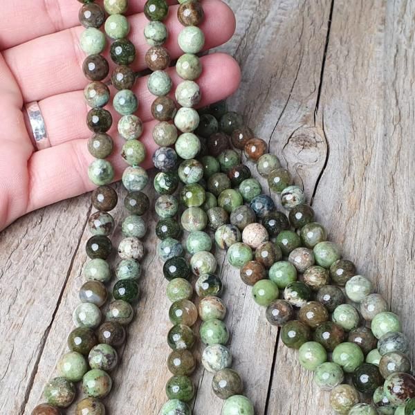 koralky-z-mineralu-opal-zeleny-8mm-leskle-hladke-nebrusene-zelene-hnede-mentolove-farebne