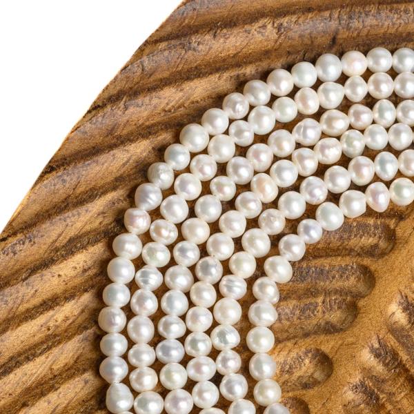 Teny�sztett gy�ngy�k 4-5 mm zsin�r