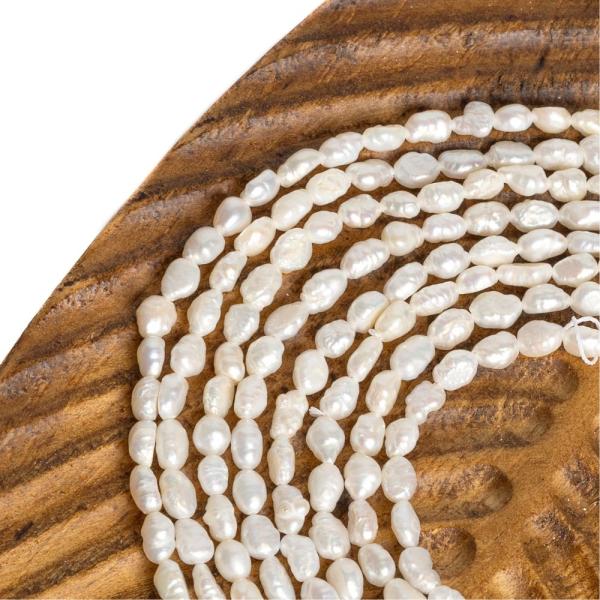 Teny�sztett gy�ngy gy�ngy�k 6x4mm hossz�k�s zsin�r