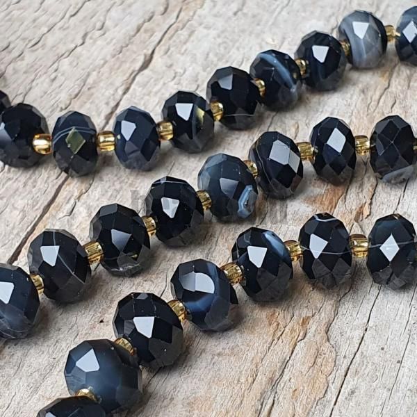 Acht csipks fekete gyngyk 6x10 mm rondellk csiszolt flhosz zsinr