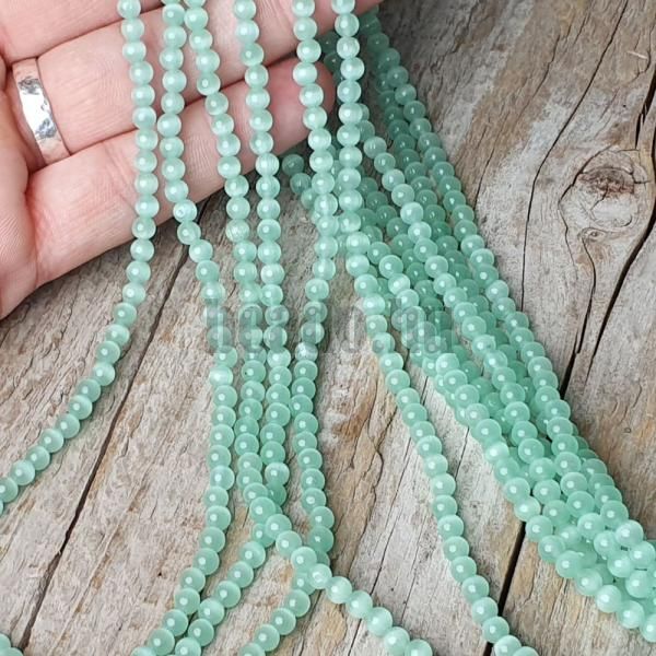 koralky-sklenene-4mm-macacie-oci-zeleno-tyrkysove-leskle-hladke-goralky-gulate-na-naramky-