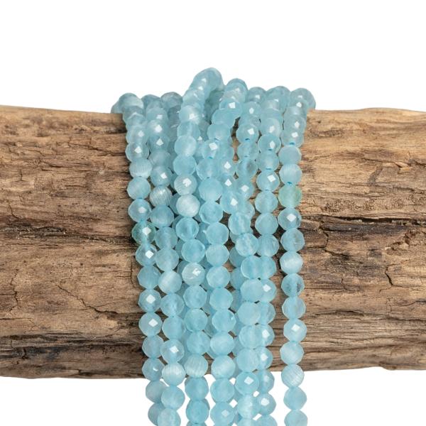 Macskaszem gy�ngy�k 3 mm csiszolt k�k zsin�r