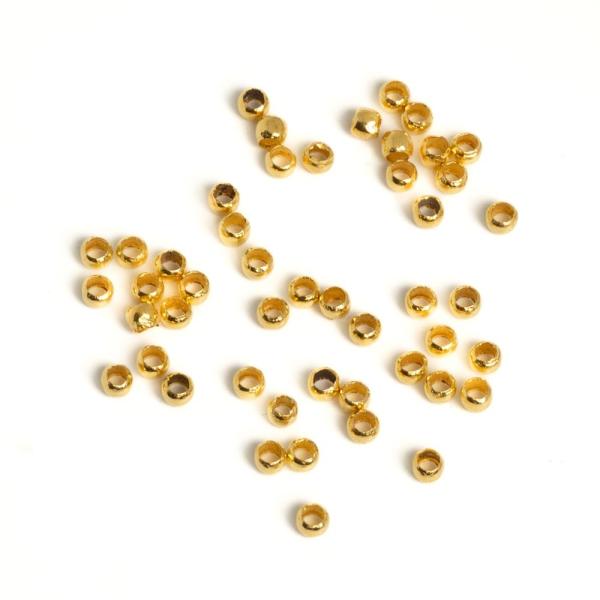 Nagy lyuk� gy�ngy 2x1, 2 mm arany 50 db