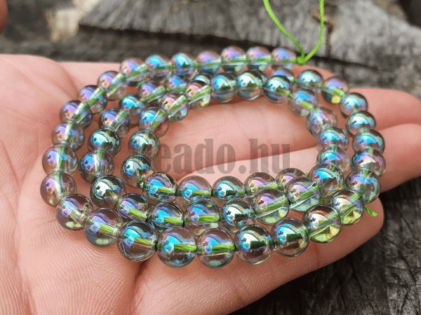 Aqua aura kristly gyngyk 6 mm zld zsinr