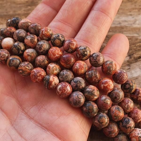 koralky-jaspis-leopardi-8mm-leskle-mix-farieb-zemite-odtiene-hnedooranzove-so-sedou-kresbo