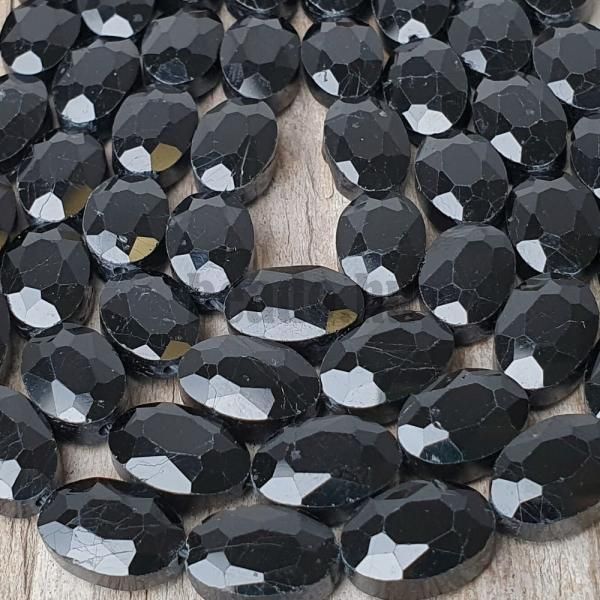 Fekete turmalin gyöngyök 8x12 mm ovális csiszolt félhosszú zsinór